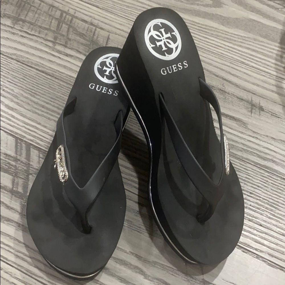 Guess wedge flip flops
